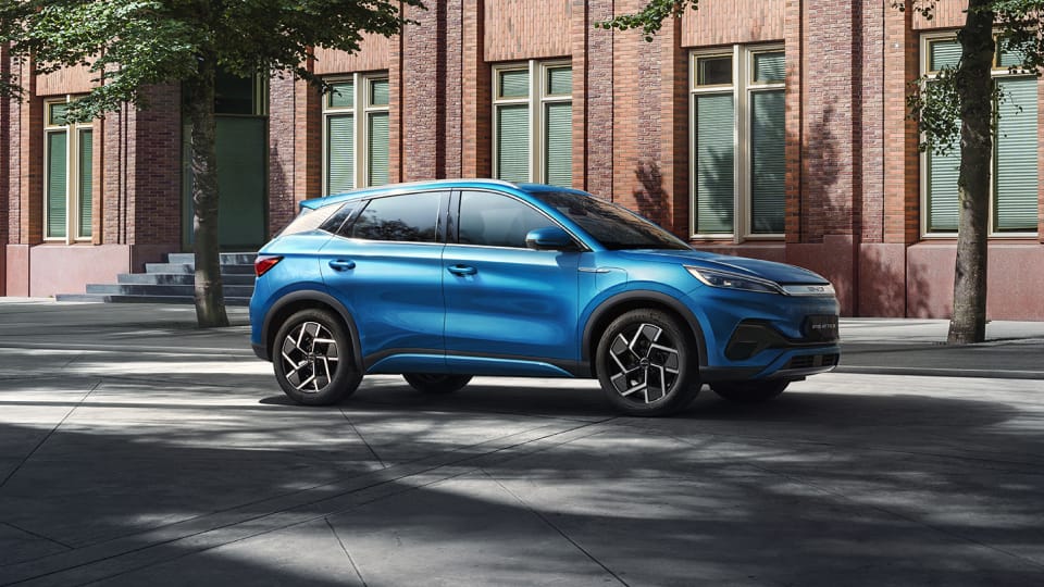 BYD ATTO 3 in metallic blue parked on a street