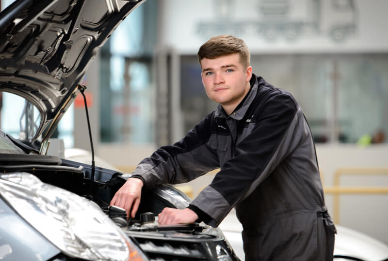 Male Technican working on car