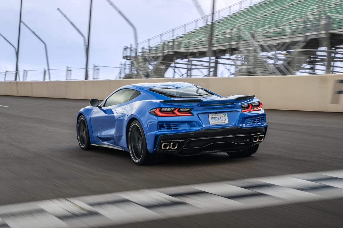 Rear angled side view of blue Corvette E-Ray