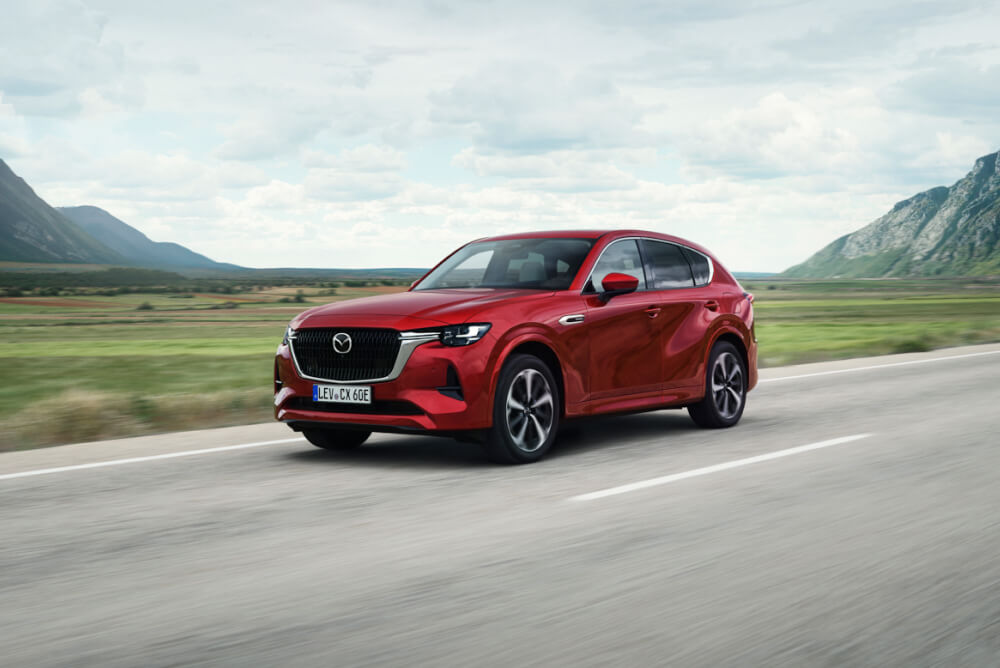 Mazda CX-60 driving on country road