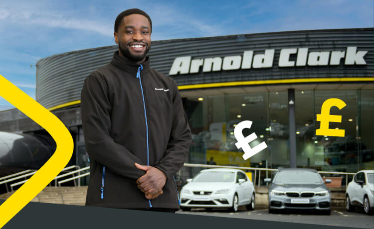 Product Consultant standing outside of an Arnold Clark branch